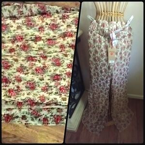 Pants NWT Full lined sheer Pleated pants